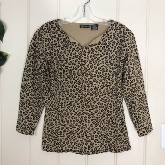George Brown & Animal Cheetah Print Blouse
3/4 Sleeve
Large
77% Silk 23% Nylon - Picture 5 of 13